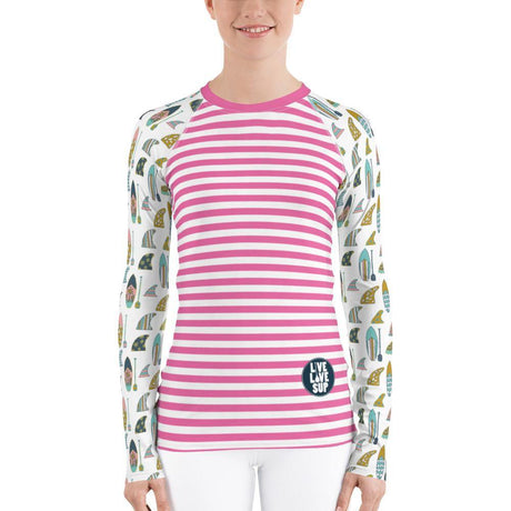 Long-sleeve women’s rashguard with hand-drawn pink stripes featuring board and paddle design, ideal for SUP, offering sun protection and a fitted, flexible design.