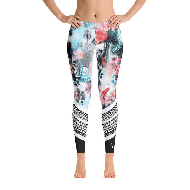 Black SUP paddle-surf leggings featuring Tahitian design and SUP paddles down each leg, made from soft microfiber polyester/spandex with four-way stretch, UPF 40+ sun protection, and precision-cut, hand-sewn craftsmanship.