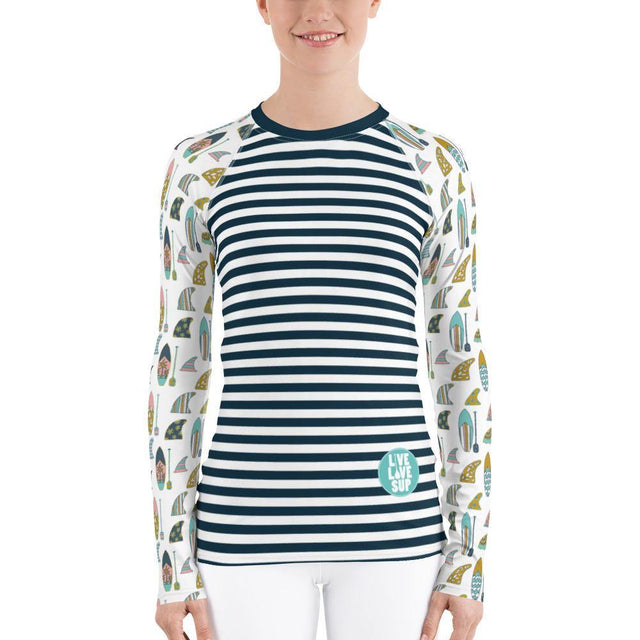Long-sleeve women’s navy striped rashguard with hand-drawn board and paddle pattern, featuring UPF 38–40 protection, soft four-way stretch fabric, flat ergonomic seams, and longer fit ideal for SUP.