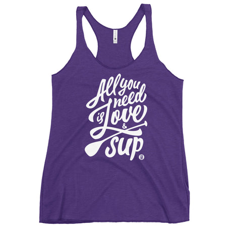 Women’s lightweight racerback tank with “All You Need is Love & SUP” graphic, tri-blend fabric (polyester/cotton/rayon), raw-edge seams, and flattering form-fitting cut available in multiple colors and sizes XS–XL.